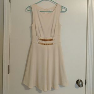 Cream dress with gold hardware